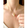 Collier tête de léopard dorée et zircon - porté sur buste de femme
