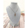 Collier petit chat en zircons - présenté sur buste gris